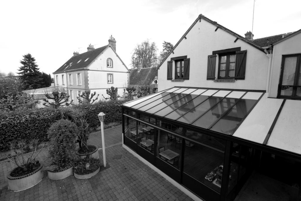 Auberge La Pomme De Pin Hotell Senonches Rom bilde